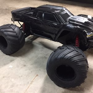 X-maxx With Losi 1/5 scale monster claw tires.