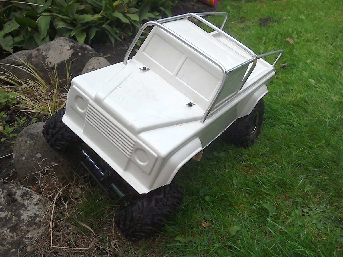 Outside with land rover body and custom rollcage